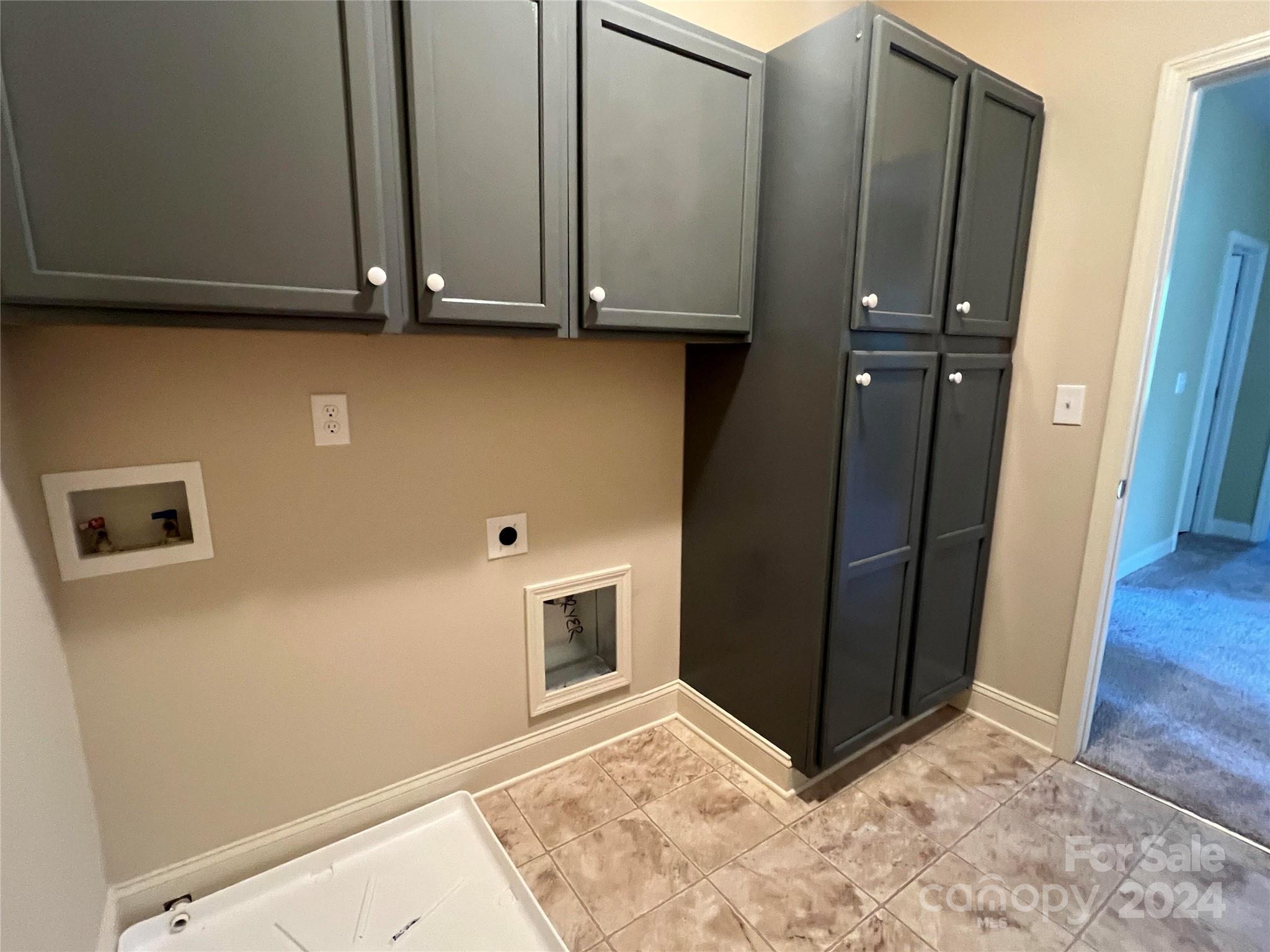 7004 Sedgewick Road Indian Trail, NC 28079 - Photo 27 of 38 a view of storage and utility room with wooden floor