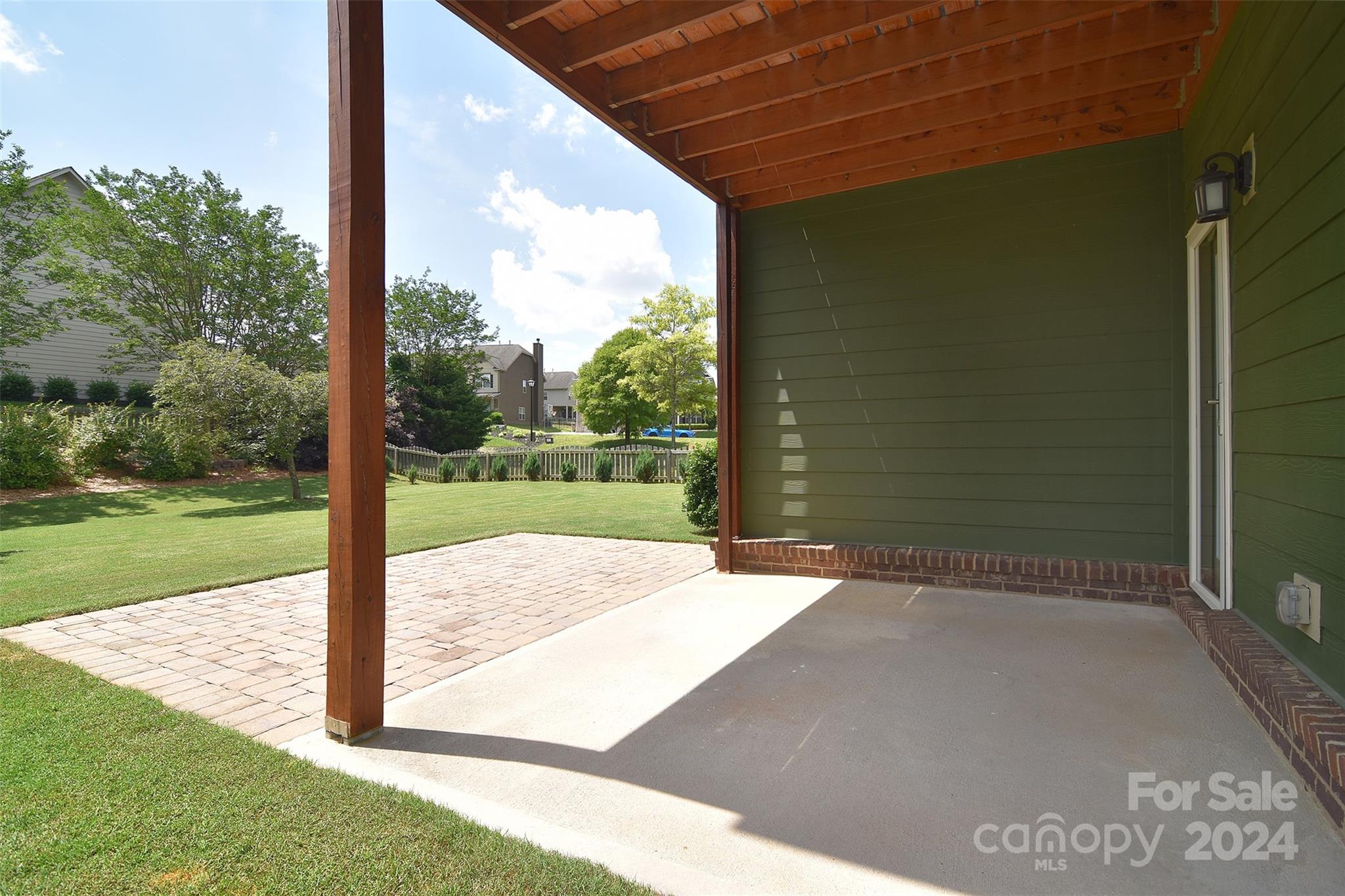 7004 Sedgewick Road Indian Trail, NC 28079 - Photo 28 of 38 a view of a porch with a yard