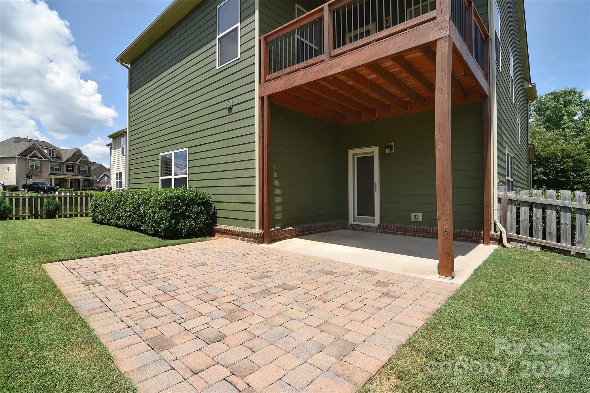 7004 Sedgewick Road Indian Trail, NC 28079 - Photo 29 of 38 a view of backyard with barbeque grill and wooden fence