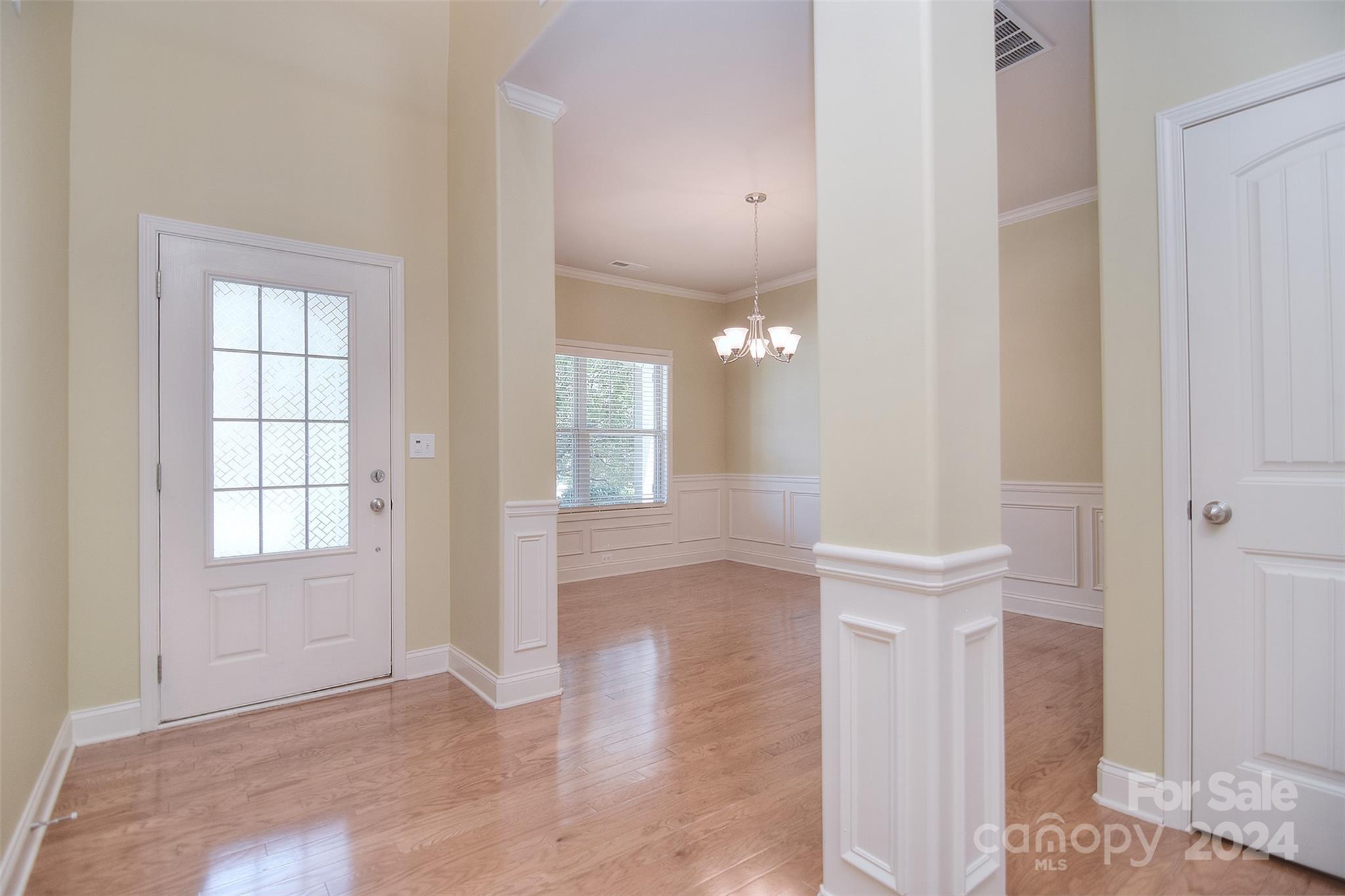 7004 Sedgewick Road Indian Trail, NC 28079 - Photo 4 of 38 an empty room with windows and entrance