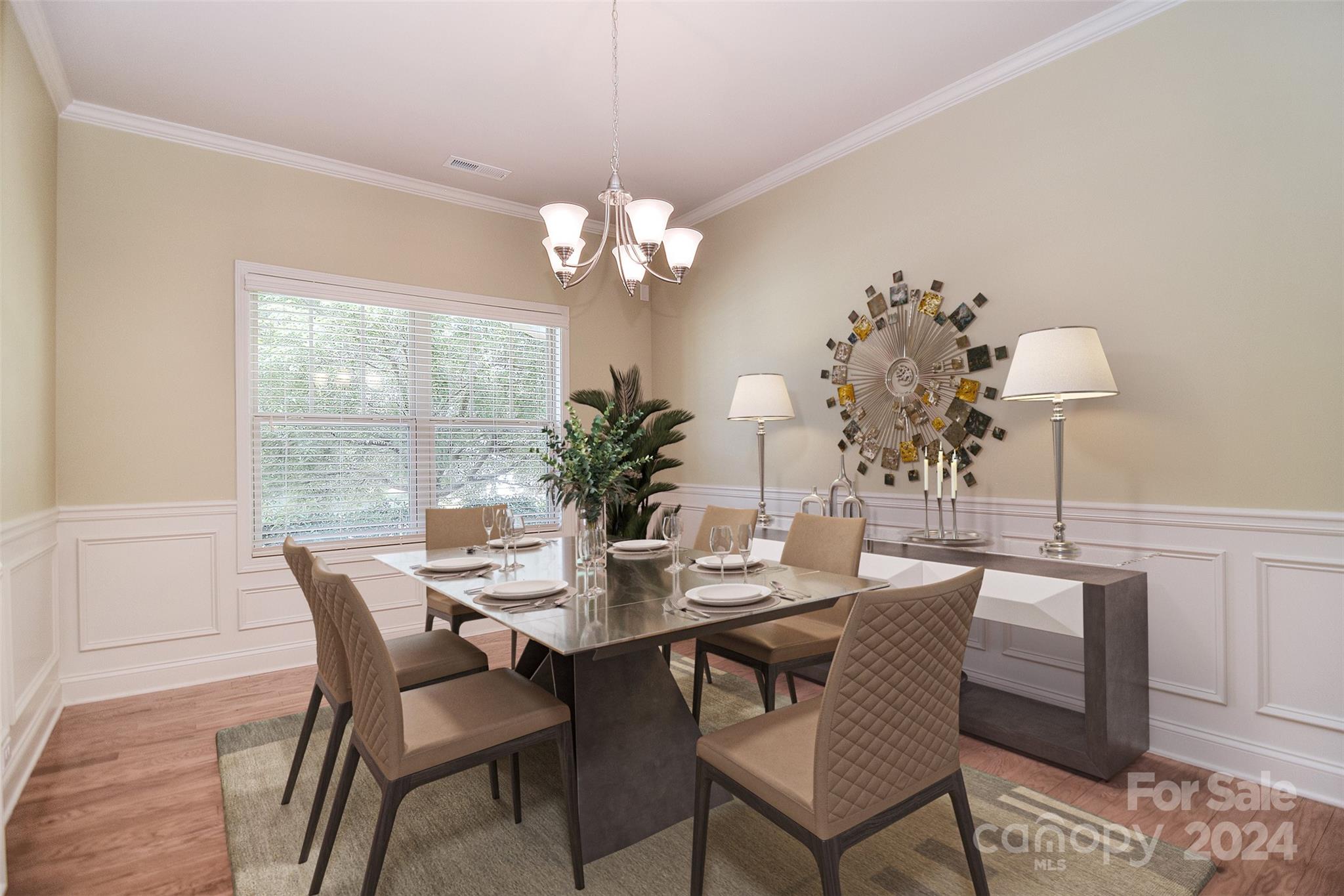 7004 Sedgewick Road Indian Trail, NC 28079 - Photo 5 of 38 a view of a dining room with furniture wooden floor and chandelier