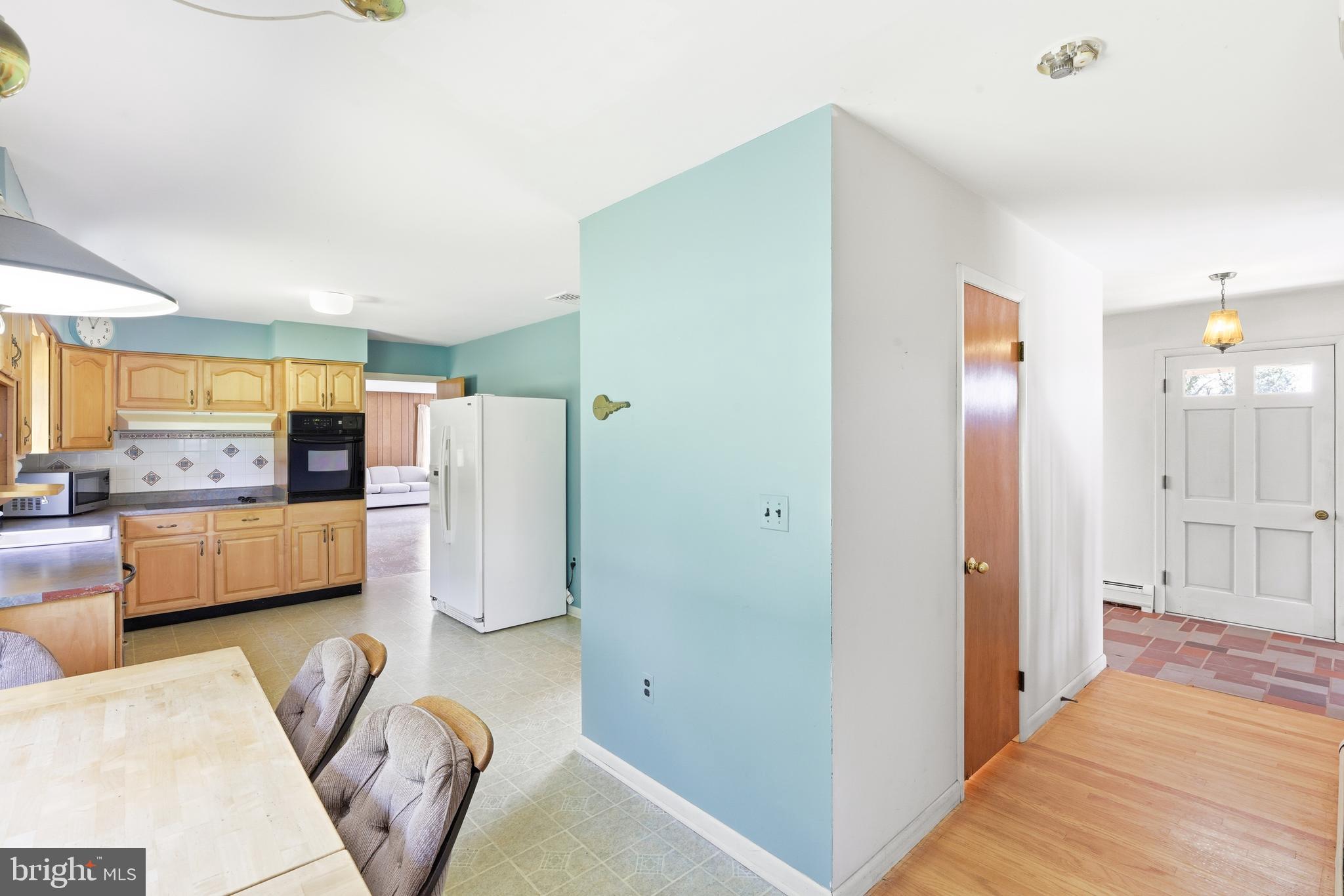 4308 Meadowcliff Road Glen Arm, MD 21057 - Photo 10 of 39 Main Level - Eat in Kitchen, powder room and foyer