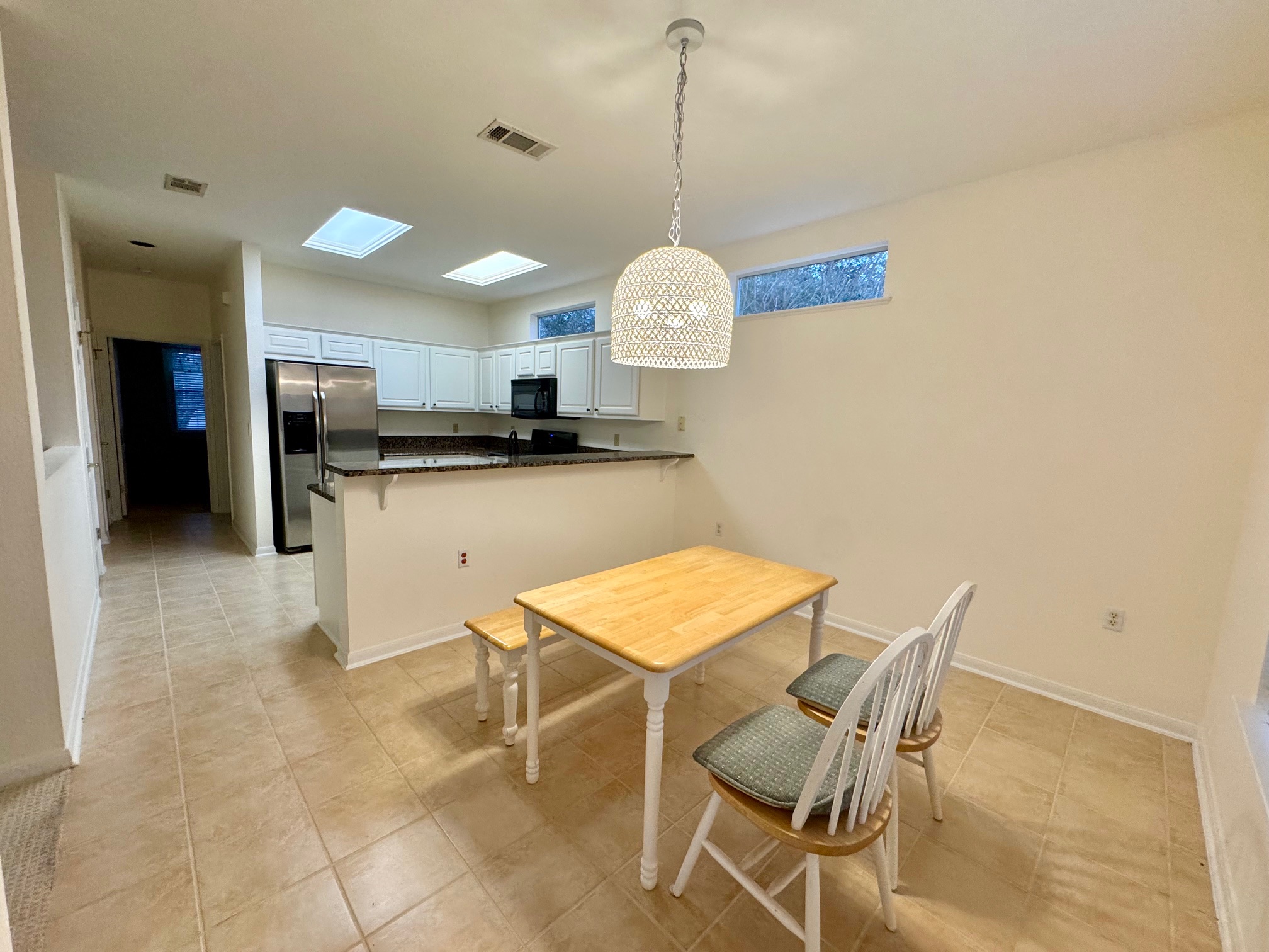262 Whispering Wind Drive Georgetown, TX 78633 - Photo 3 of 20 Dining room featuring baseboards