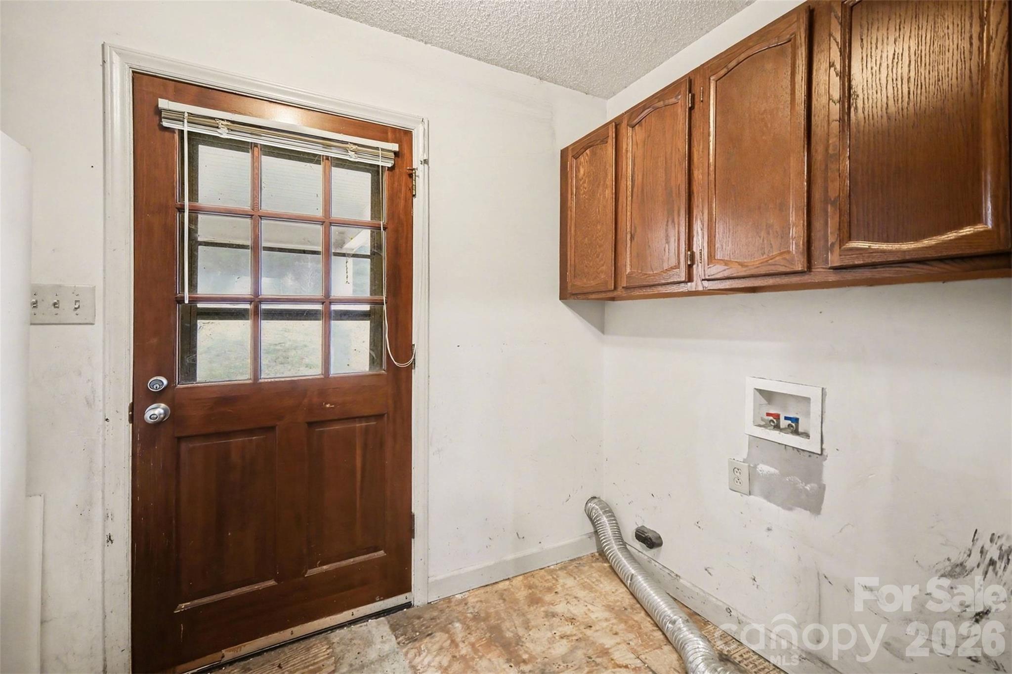 16421 Shallow Pond Road Charlotte, NC 28278 - Photo 15 of 24 a view of a dresser and window in an empty room