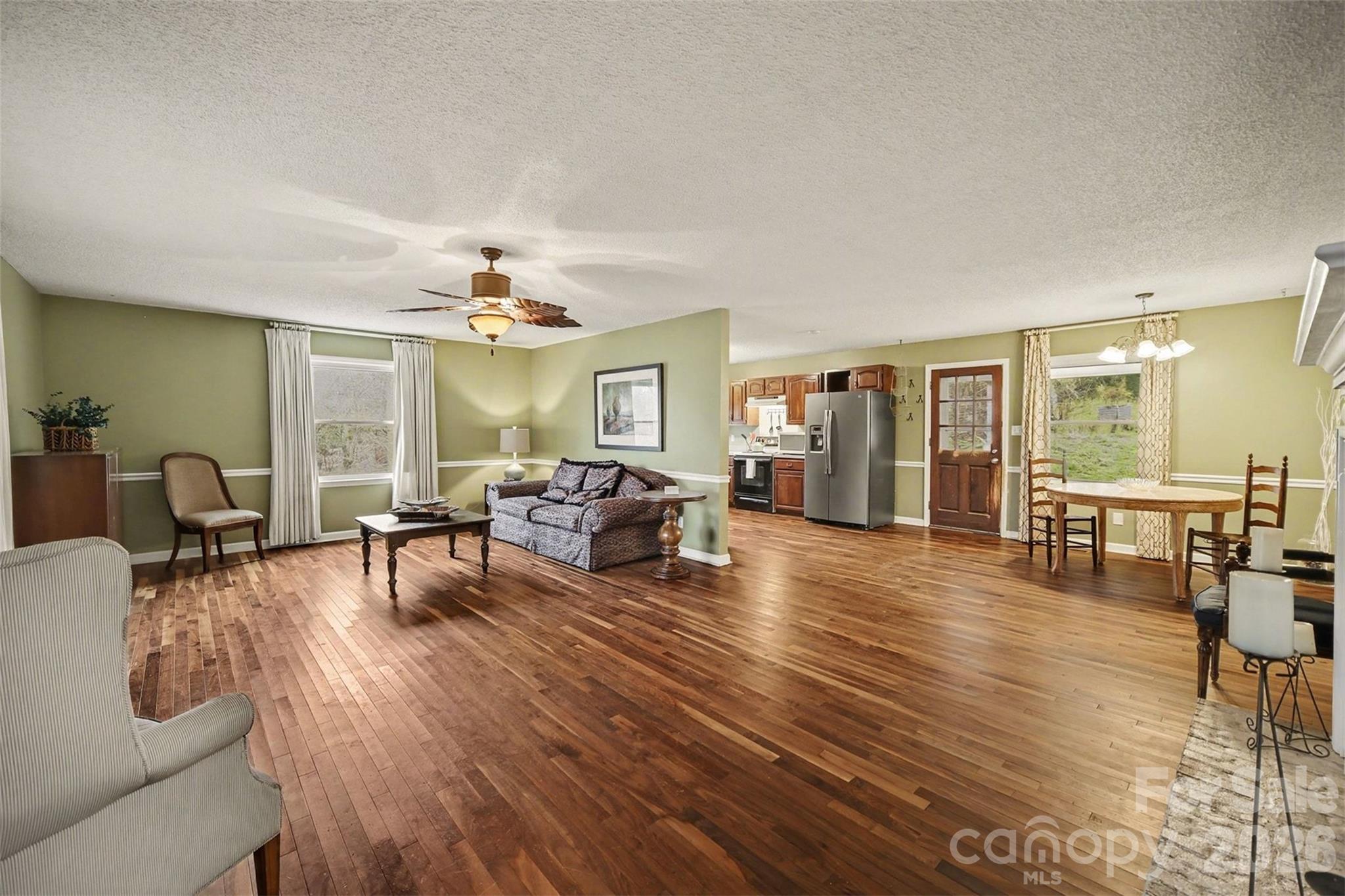 16421 Shallow Pond Road Charlotte, NC 28278 - Photo 4 of 24 a living room with furniture and wooden floor