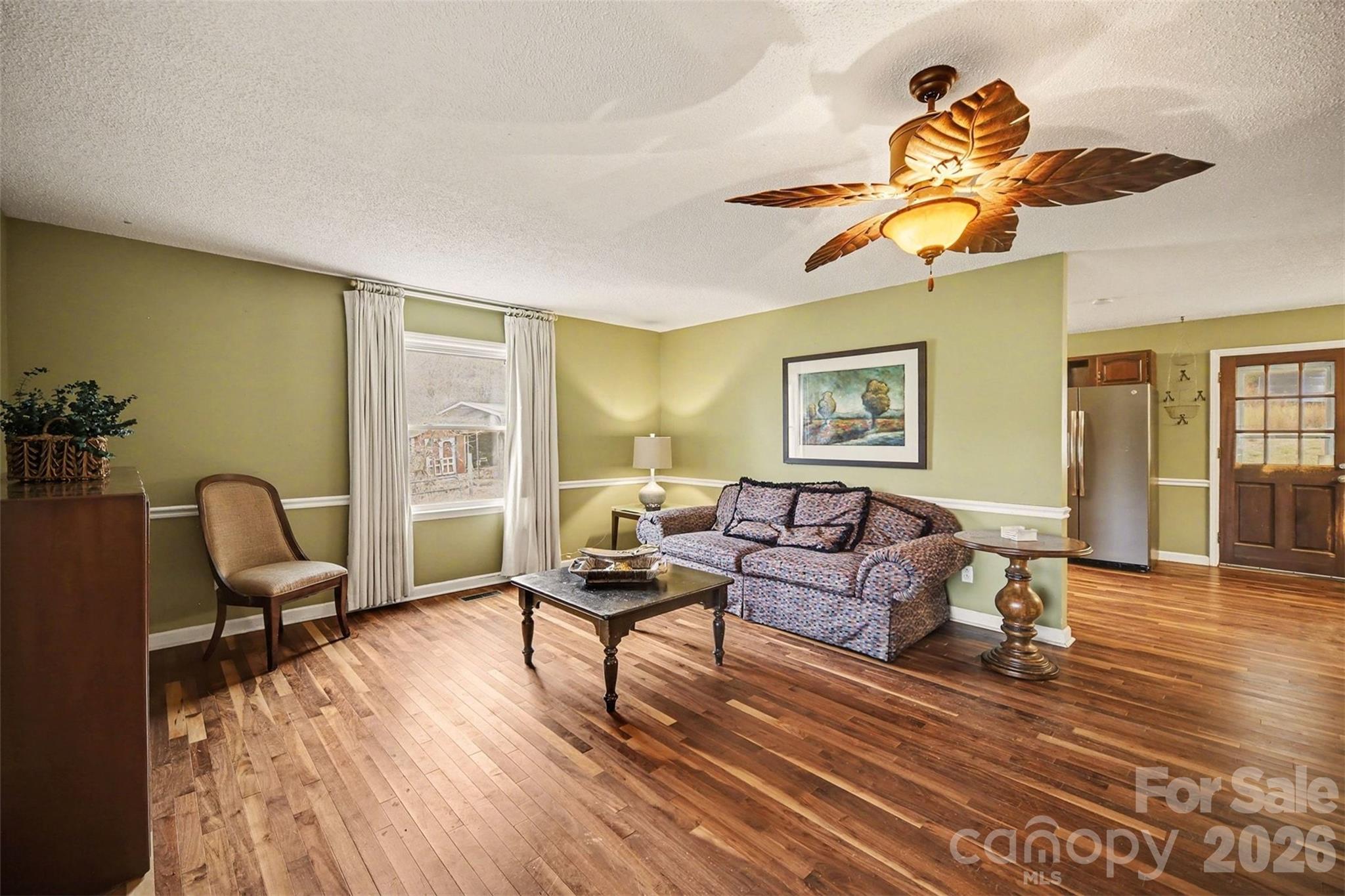 16421 Shallow Pond Road Charlotte, NC 28278 - Photo 5 of 24 a living room with furniture and wooden floor