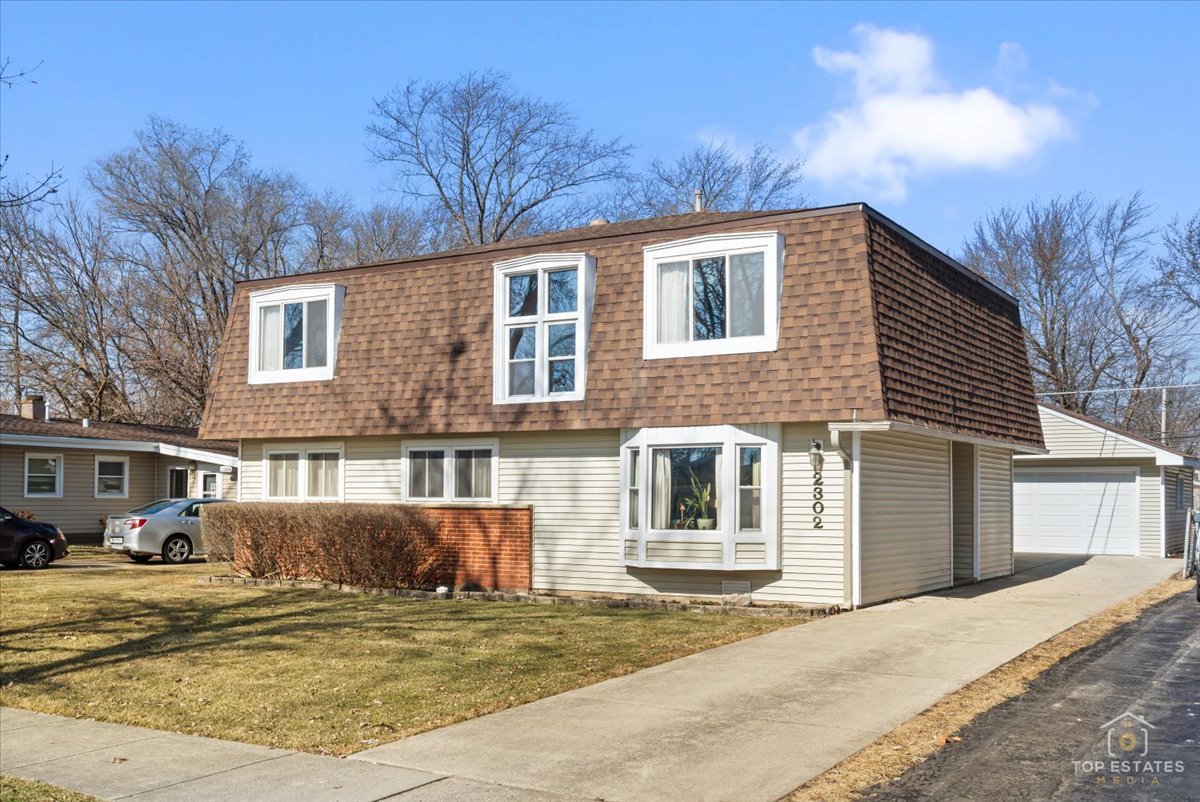 2302 Fulle Street Rolling Meadows, IL 60008 - Photo 1 of 48 a view of a house with a patio