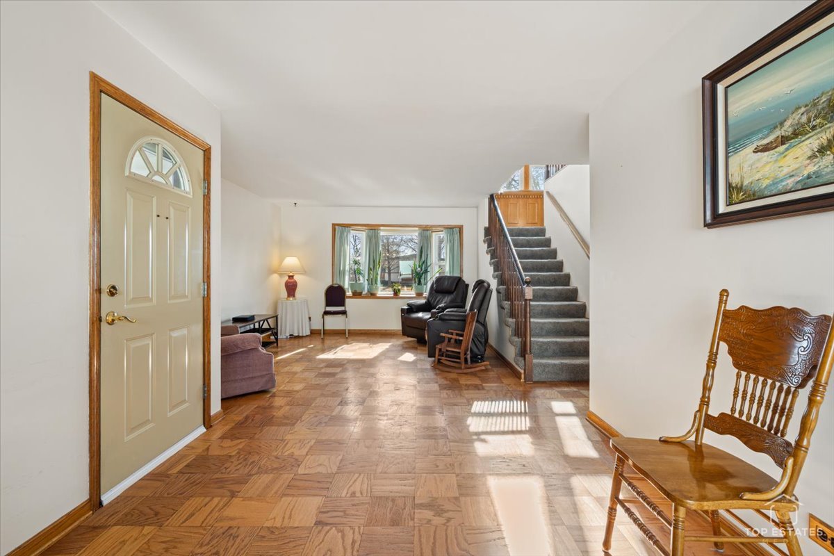2302 Fulle Street Rolling Meadows, IL 60008 - Photo 15 of 48 a view of a livingroom with furniture and staircase