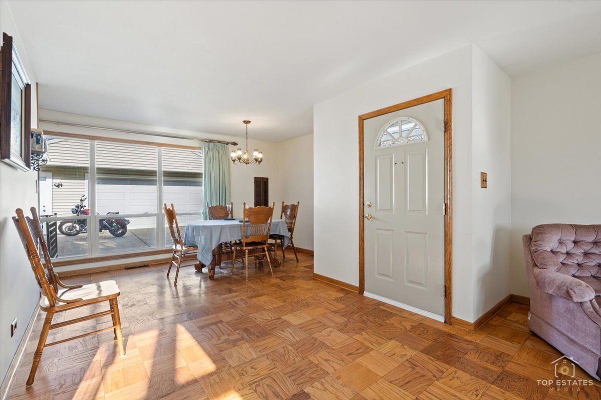 2302 Fulle Street Rolling Meadows, IL 60008 - Photo 18 of 48 a view of a a dining room with furniture window and outside view