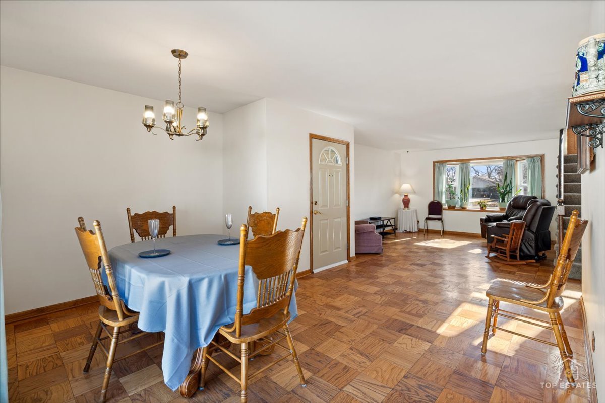 2302 Fulle Street Rolling Meadows, IL 60008 - Photo 3 of 48 a view of a dining room with furniture