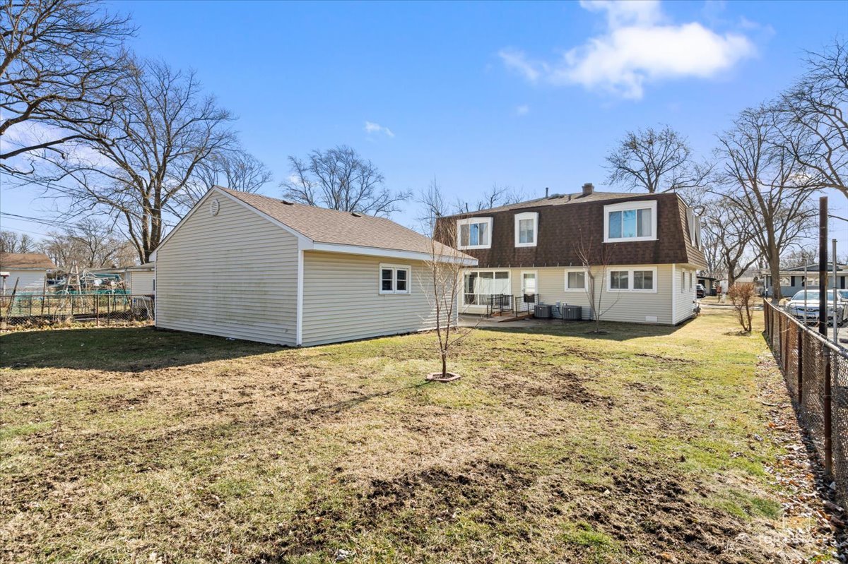 2302 Fulle Street Rolling Meadows, IL 60008 - Photo 35 of 48 a house with trees in the background
