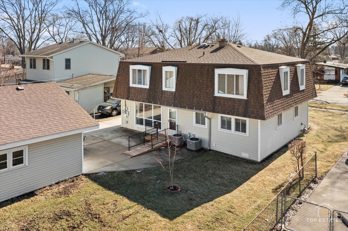 2302 Fulle Street Rolling Meadows, IL 60008 - Photo 36 of 48 a view of a house with a yard