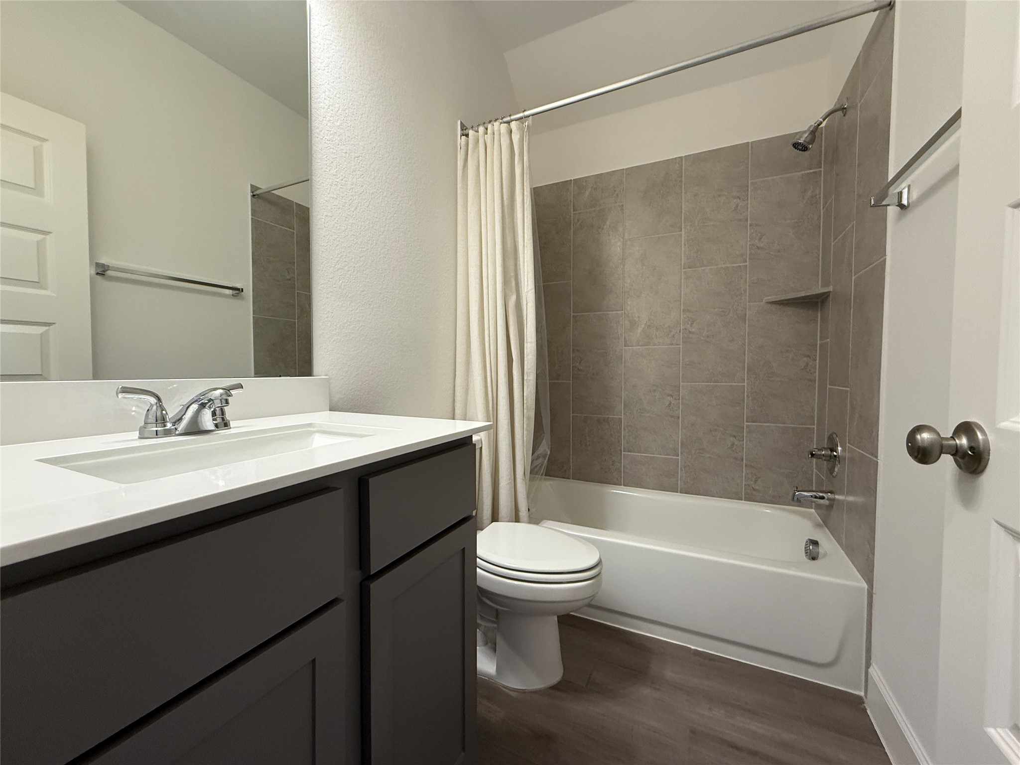 1354 Lakeside Crk Road Magnolia, TX 77354 - Photo 18 of 26 a bathroom with a sink toilet and shower