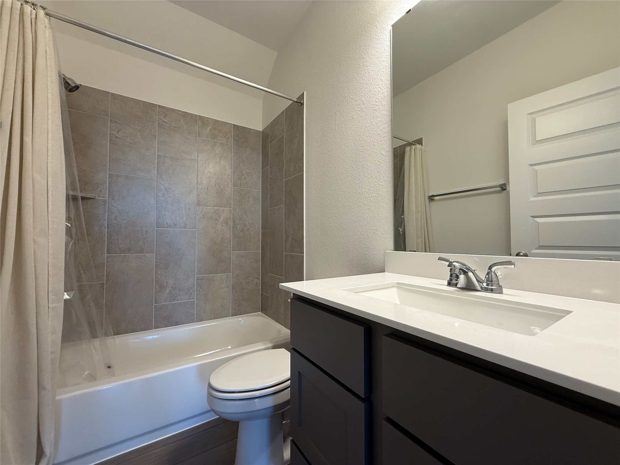 1354 Lakeside Crk Road Magnolia, TX 77354 - Photo 20 of 26 a bathroom with a sink a toilet and shower