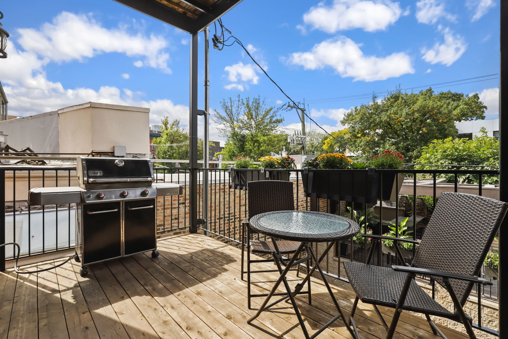 2140 North Racine Avenue, Unit 2 Chicago, IL 60614 - Photo 3 of 3 a view of a chairs and table in the patio
