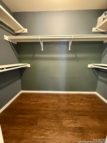 a view of a refrigerator in a room