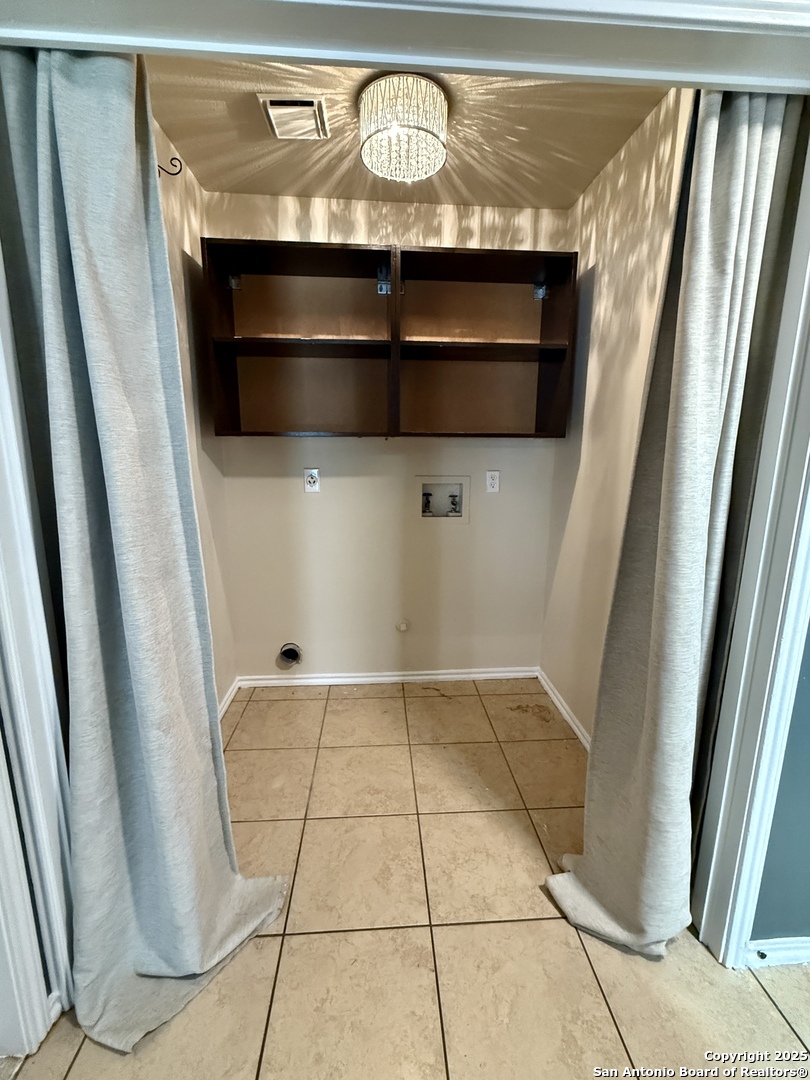 821 Dimrock Schertz, TX 78154 - Photo 10 of 20 a view of washer and dryer