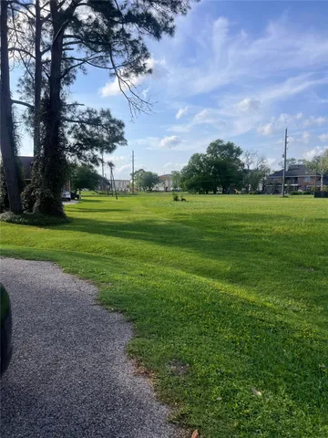 a view of a golf course with a garden