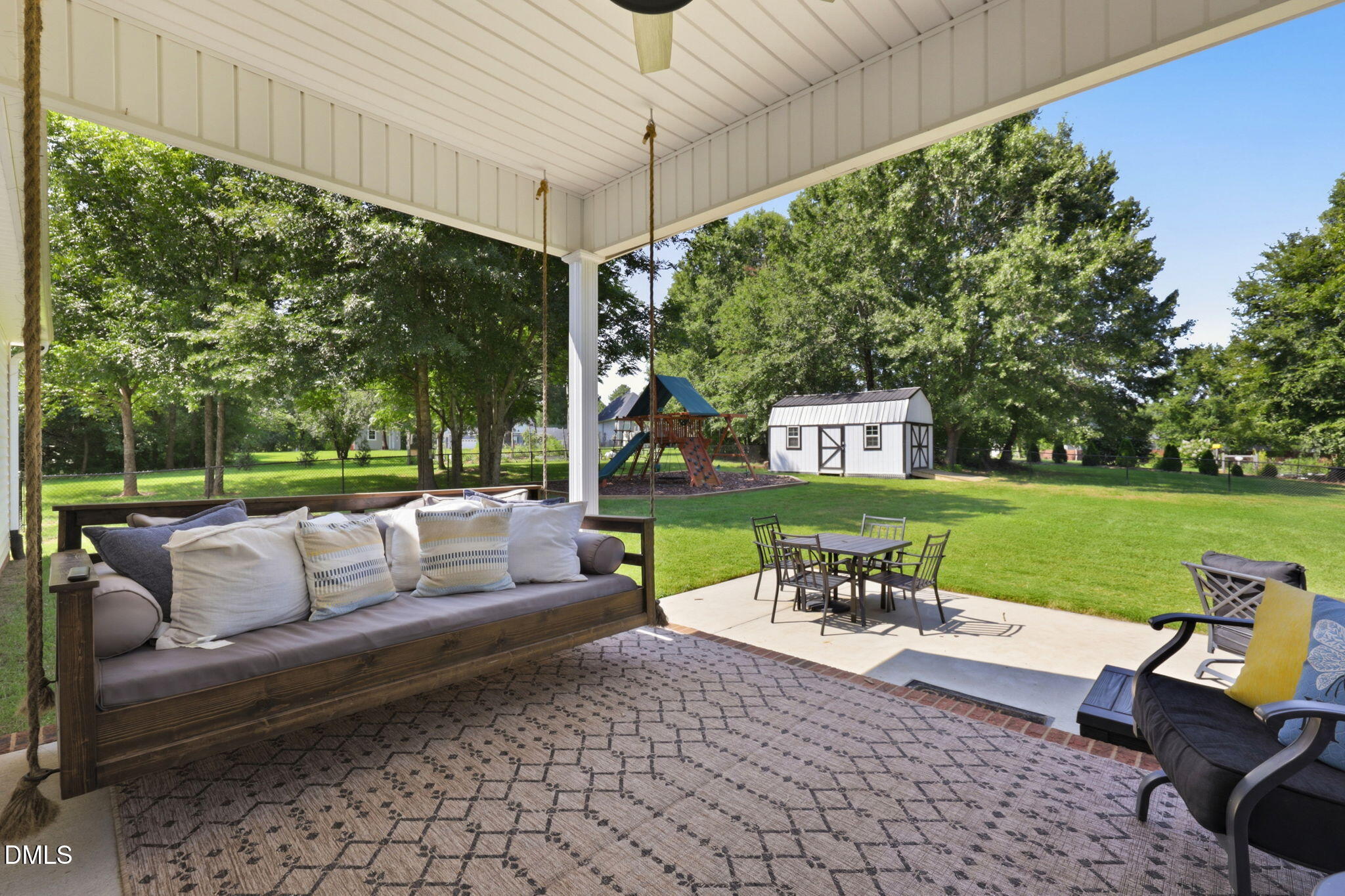 3632 Warfield Road Graham, NC 27253 - Photo 23 of 40 Covered Rear Porch with Porch Bed Swing