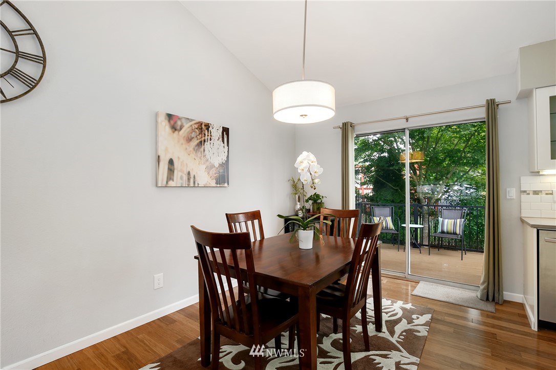 3602 Northeast 11th Court Renton, WA 98056 - Photo 9 of 25 a view of a dining room with furniture window and wooden floor