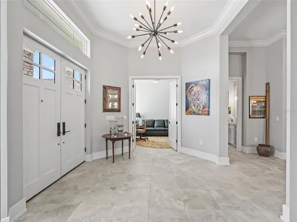 a bathroom with a sink vanity mirror and toilet