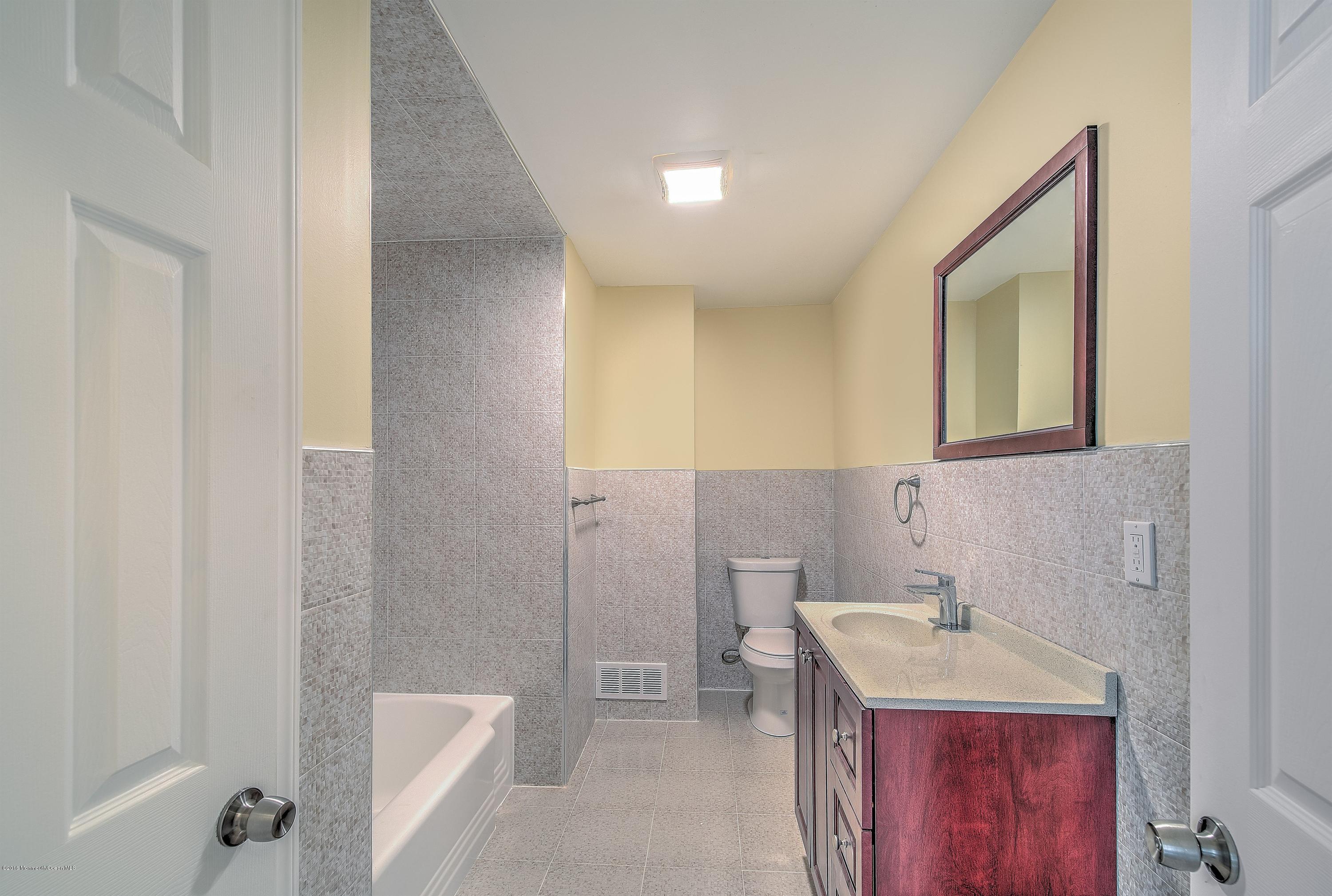2 Nolan Road Allentown, NJ 08501 - Photo 17 of 26 a bathroom with a sink a toilet and shower