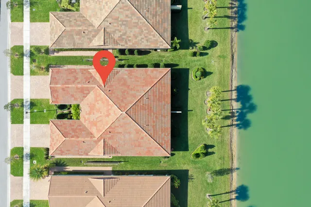 a view of a house with a small yard