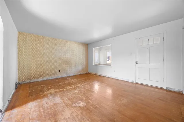 a view of an empty room and window