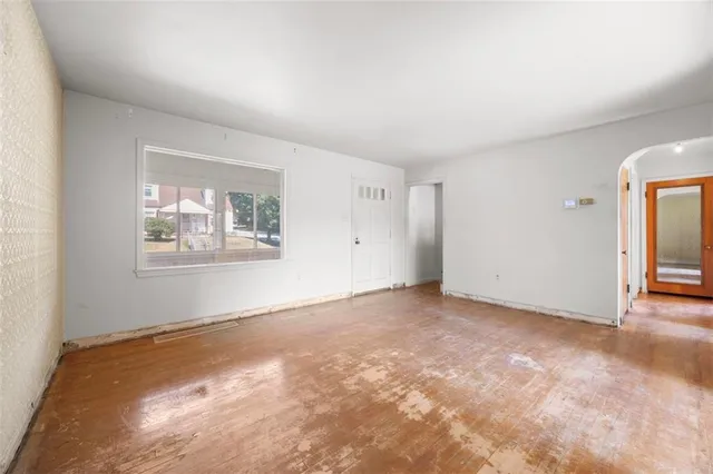 an empty room with windows