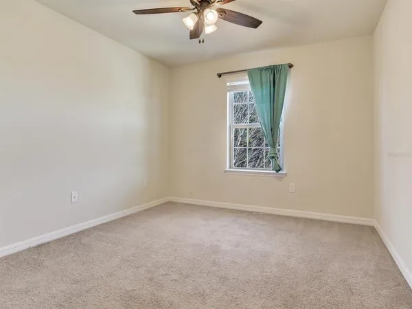 a bathroom with a tub and shower