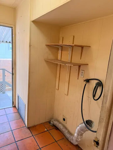 a bathroom with a sink a mirror and vanity