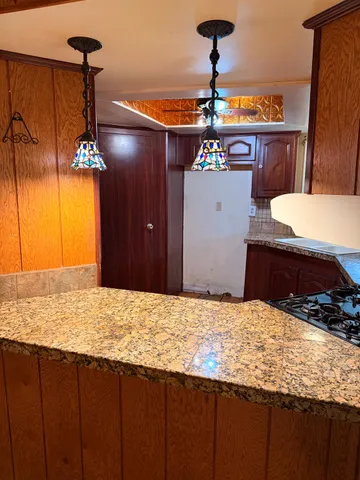 a view of staircase with large window