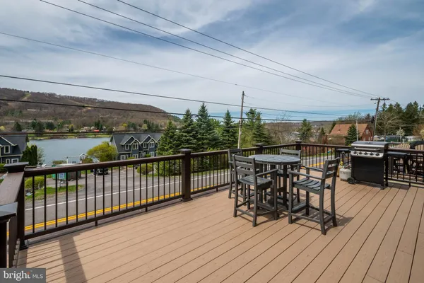a view of a balcony with chairs