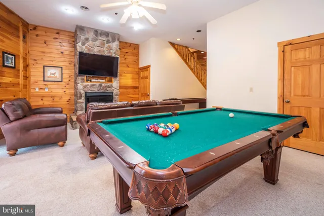 a bathroom with a refrigerator and a sink