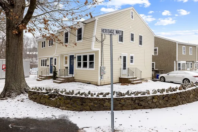 a front view of house with a yard