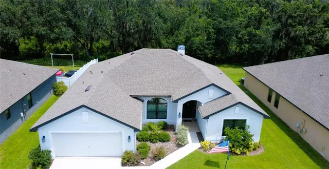 a house view with a garden space