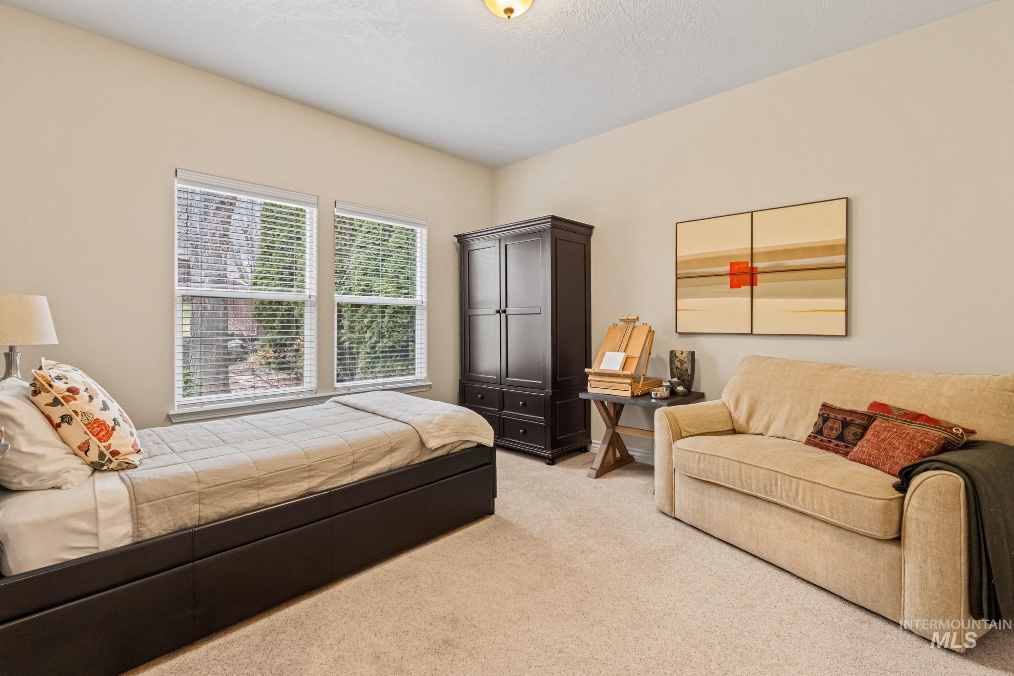 4235 Trekker Rim Drive East Boise, ID 83716 - Photo 12 of 33 Bedroom with light carpet