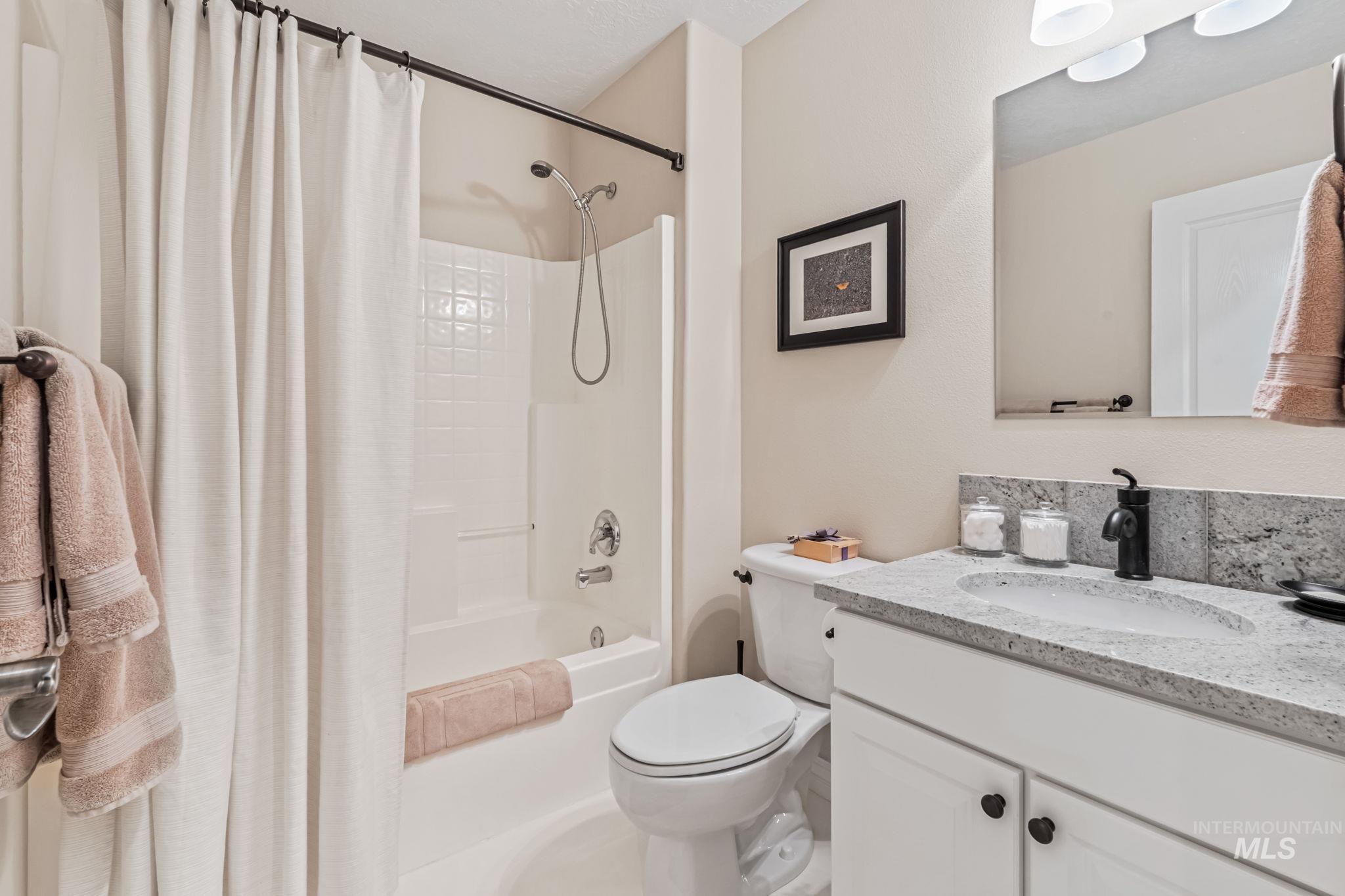 4235 Trekker Rim Drive East Boise, ID 83716 - Photo 22 of 33 Full bath with shower / tub combo and vanity