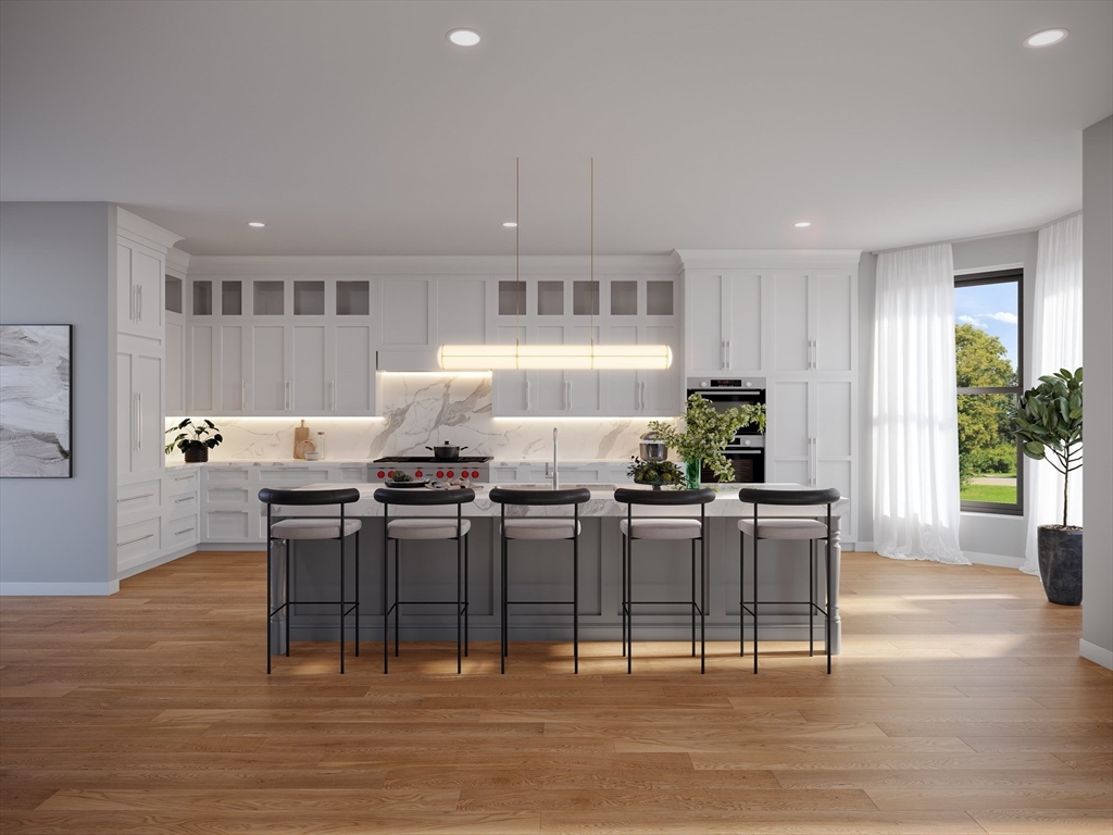 323 Commonwealth Avenue, Unit PH Boston, MA 02115 - Photo 2 of 9 a living room with furniture a window and a table