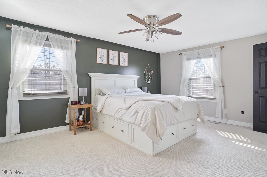 15575 Stillwell Road Huntsburg, OH 44046 - Photo 34 of 48 Master Bedroom featuring carpet and a ceiling fan