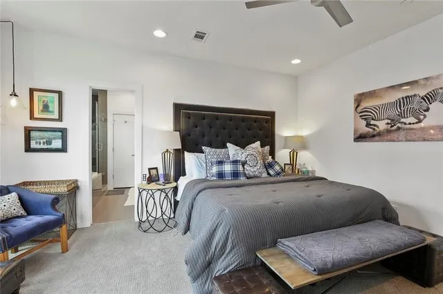 a bed room with furniture and a couch