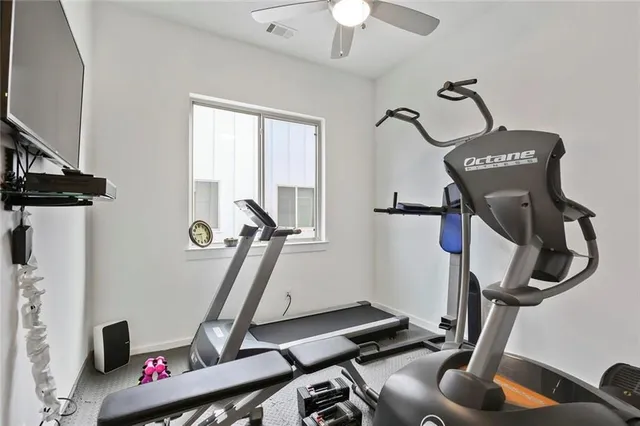 a view of a room with gym equipment