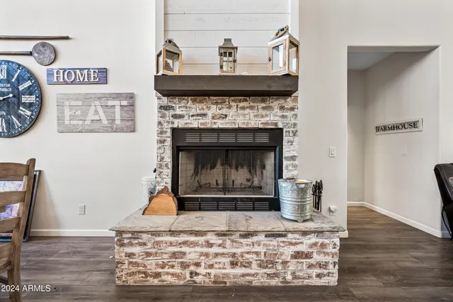 a view of a backyard with sitting area