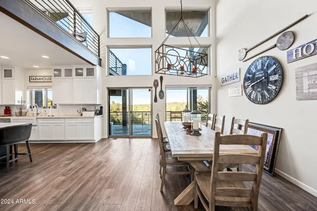 a bed room with a bed and a television