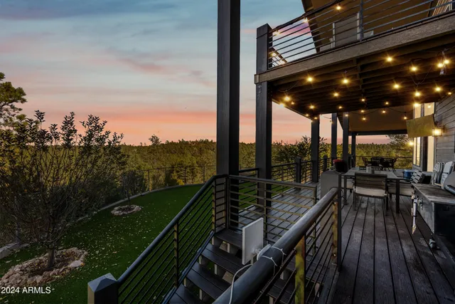 a white bath tub sitting next to a shower