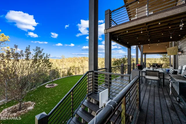 a view of a garage with a bike and car