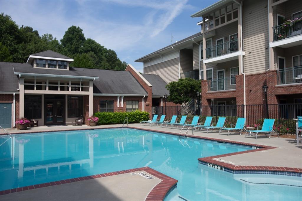 2000 Monroe Place Northeast, Unit 1306 Atlanta, GA 30324 - Photo 11 of 18 a front view of a house with swimming pool and sitting space