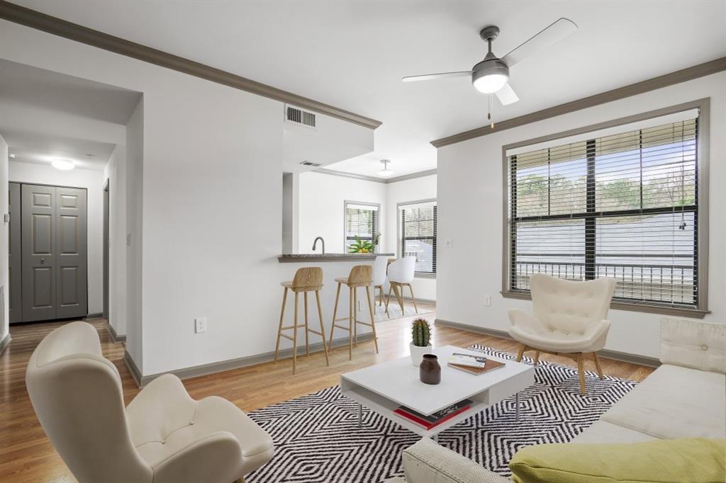2000 Monroe Place Northeast, Unit 1306 Atlanta, GA 30324 - Photo 3 of 18 a living room with furniture and a window