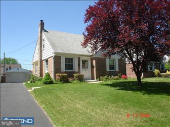 508 Bonsall Road Ridley Park, PA 19078 - Photo 1 of 6 a view of a house with a yard and garden