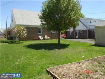 508 Bonsall Road Ridley Park, PA 19078 - Photo 6 of 6 a view of a house with backyard and sitting area